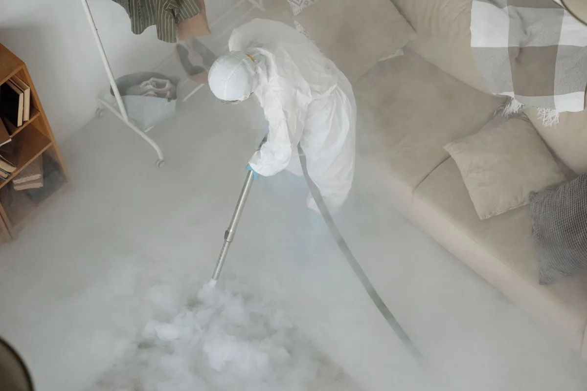 Biohazard cleanup technician in protective equipment, Port Norris, NJ